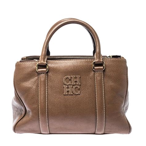 carolina herrera bags prices online.